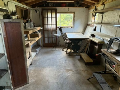 This charming Northwoods-style 1 bed, 1 bath cabin is just on Northern Bay Golf Resort and Marina in Wisconsin - for sale on GolfHomes.com, golf home, golf lot