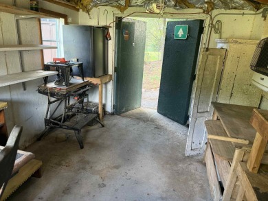 This charming Northwoods-style 1 bed, 1 bath cabin is just on Northern Bay Golf Resort and Marina in Wisconsin - for sale on GolfHomes.com, golf home, golf lot