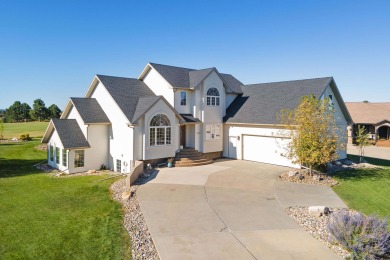 Refined Living in Red Rock Estates set along the 9th fairway of on Golf Club At Red Rock in South Dakota - for sale on GolfHomes.com, golf home, golf lot