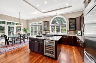 Experience luxury living in this stunning villa, perfectly on Meadowbrook Country Club in Missouri - for sale on GolfHomes.com, golf home, golf lot