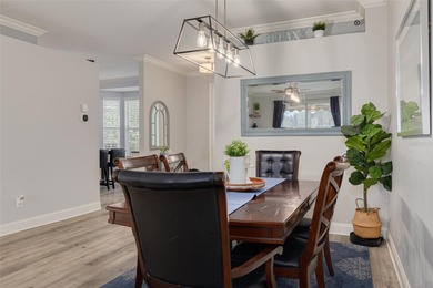 NEW TO THE MARKET! Discover this beautifully updated home in the on Hunters Green Country Club in Florida - for sale on GolfHomes.com, golf home, golf lot