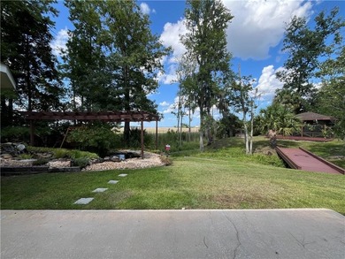 Sanctuary of Elegance and Serenity - Nestled amidst nature's on Laurel Island Links in Georgia - for sale on GolfHomes.com, golf home, golf lot