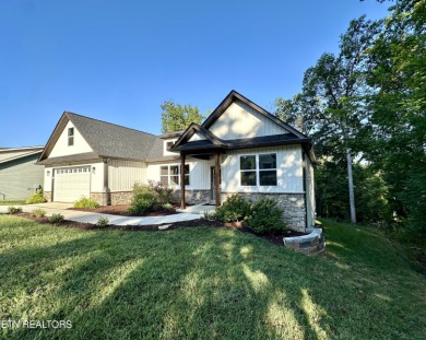 Come live on ''the Circle,'' the friendliest corner of Tellico on Tellico Village Golf Club in Tennessee - for sale on GolfHomes.com, golf home, golf lot