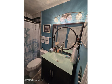 live waterfront at an affordable price. Waterfront views of on Brick Landing Plantation Yacht and Golf Club in North Carolina - for sale on GolfHomes.com, golf home, golf lot