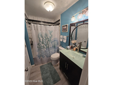 live waterfront at an affordable price. Waterfront views of on Brick Landing Plantation Yacht and Golf Club in North Carolina - for sale on GolfHomes.com, golf home, golf lot