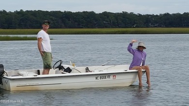 live waterfront at an affordable price. Waterfront views of on Brick Landing Plantation Yacht and Golf Club in North Carolina - for sale on GolfHomes.com, golf home, golf lot