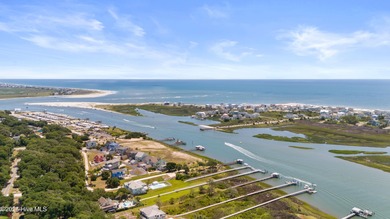 live waterfront at an affordable price. Waterfront views of on Brick Landing Plantation Yacht and Golf Club in North Carolina - for sale on GolfHomes.com, golf home, golf lot