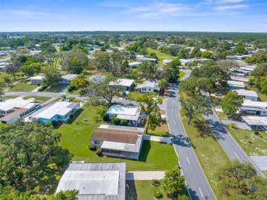 Welcome to this beautifully maintained, move-in ready 2-bedroom on High Point Golf Club, Inc. in Florida - for sale on GolfHomes.com, golf home, golf lot