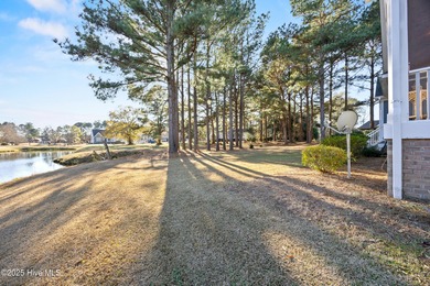 Set within the picturesque River Landing golf community, this on River Landing Golf Course in North Carolina - for sale on GolfHomes.com, golf home, golf lot