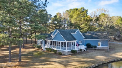 Set within the picturesque River Landing golf community, this on River Landing Golf Course in North Carolina - for sale on GolfHomes.com, golf home, golf lot