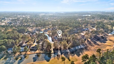 Set within the picturesque River Landing golf community, this on River Landing Golf Course in North Carolina - for sale on GolfHomes.com, golf home, golf lot