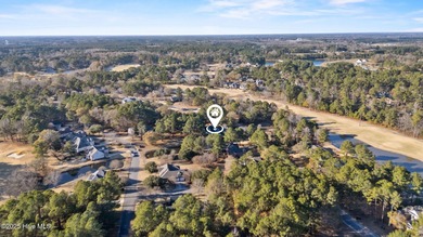 Set within the picturesque River Landing golf community, this on River Landing Golf Course in North Carolina - for sale on GolfHomes.com, golf home, golf lot