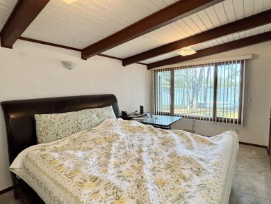 LAKEFRONT HOME - Fabulous 3 bedroom 2 bath home with amazing on Garland Resort and Golf Club  in Michigan - for sale on GolfHomes.com, golf home, golf lot