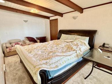 LAKEFRONT HOME - Fabulous 3 bedroom 2 bath home with amazing on Garland Resort and Golf Club  in Michigan - for sale on GolfHomes.com, golf home, golf lot