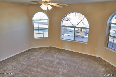 POOL HOME. Spacious 3 bedroom 2.5 bath property located in the on Los Lagos Golf Club in Arizona - for sale on GolfHomes.com, golf home, golf lot