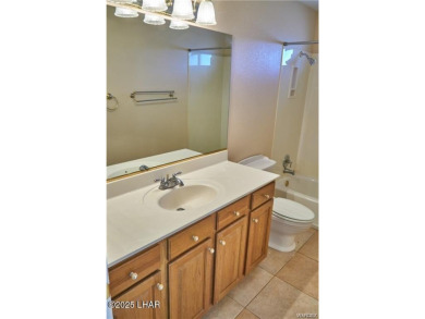 POOL HOME. Spacious 3 bedroom 2.5 bath property located in the on Los Lagos Golf Club in Arizona - for sale on GolfHomes.com, golf home, golf lot