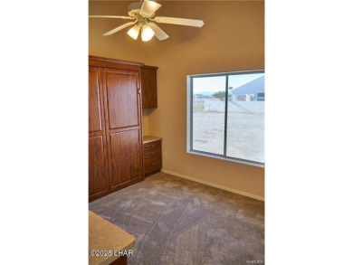 POOL HOME. Spacious 3 bedroom 2.5 bath property located in the on Los Lagos Golf Club in Arizona - for sale on GolfHomes.com, golf home, golf lot