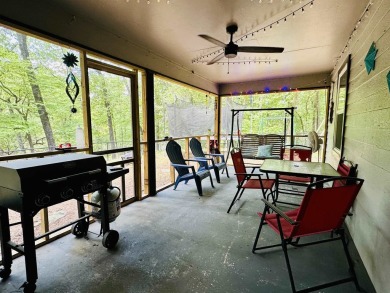 This spacious 4 (possibly 5) bedroom, 2 bathroom home is nestled on Selmer Country Club in Tennessee - for sale on GolfHomes.com, golf home, golf lot