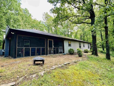 This spacious 4 (possibly 5) bedroom, 2 bathroom home is nestled on Selmer Country Club in Tennessee - for sale on GolfHomes.com, golf home, golf lot