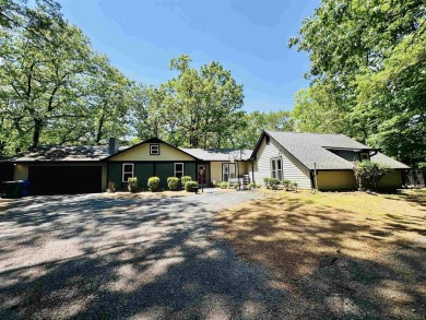 This spacious 4 (possibly 5) bedroom, 2 bathroom home is nestled on Selmer Country Club in Tennessee - for sale on GolfHomes.com, golf home, golf lot