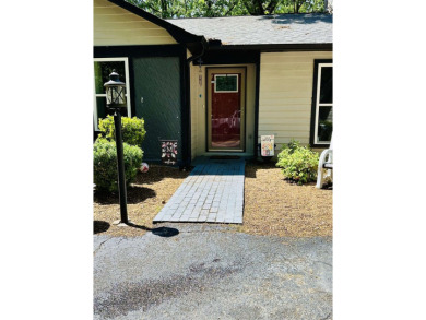 This spacious 4 (possibly 5) bedroom, 2 bathroom home is nestled on Selmer Country Club in Tennessee - for sale on GolfHomes.com, golf home, golf lot
