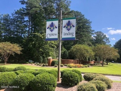 Plan your dream home on this prime residential lot for sale in on Cypress Landing Golf Club in North Carolina - for sale on GolfHomes.com, golf home, golf lot