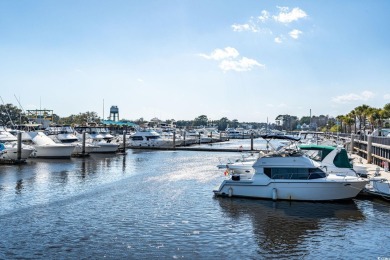 Wake up to breathtaking sunrises over the Intracoastal Waterway on Barefoot Resort and Golf Club  in South Carolina - for sale on GolfHomes.com, golf home, golf lot