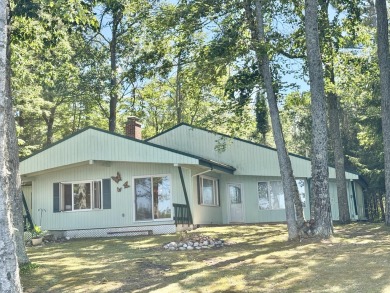 LAKEFRONT HOME - Fabulous 3 bedroom 2 bath home with amazing on Garland Resort and Golf Club  in Michigan - for sale on GolfHomes.com, golf home, golf lot