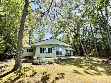LAKEFRONT HOME - Fabulous 3 bedroom 2 bath home with amazing on Garland Resort and Golf Club  in Michigan - for sale on GolfHomes.com, golf home, golf lot
