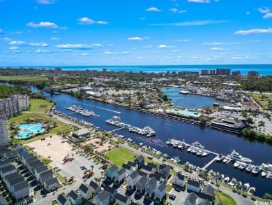 Wake up to breathtaking sunrises over the Intracoastal Waterway on Barefoot Resort and Golf Club  in South Carolina - for sale on GolfHomes.com, golf home, golf lot