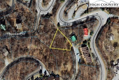 Rare opportunity to own a buildable gently sloped .29-acre lot on Elk River Club in North Carolina - for sale on GolfHomes.com, golf home, golf lot