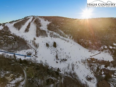 Rare opportunity to own a buildable gently sloped .29-acre lot on Elk River Club in North Carolina - for sale on GolfHomes.com, golf home, golf lot