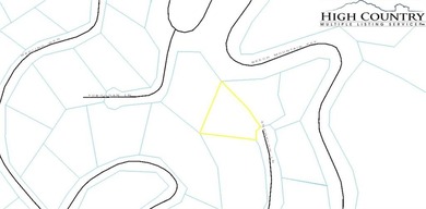 Rare opportunity to own a buildable gently sloped .29-acre lot on Elk River Club in North Carolina - for sale on GolfHomes.com, golf home, golf lot