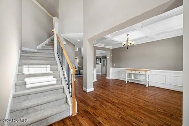 Situated on a corner lot, this home welcomes you with a concrete on The Neuse Golf Club in North Carolina - for sale on GolfHomes.com, golf home, golf lot