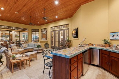 Nestled within the exclusive Gardens of Isleworth enclave within on Isleworth Golf and Country Club in Florida - for sale on GolfHomes.com, golf home, golf lot