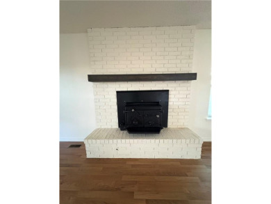 Nice two level brick home in a gorgeous area close to the lake on Prairie Creek Country Club in Arkansas - for sale on GolfHomes.com, golf home, golf lot