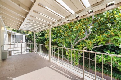 This is a light and bright upstairs coop in the heart of Laguna on Laguna Woods Village Golf Course in California - for sale on GolfHomes.com, golf home, golf lot