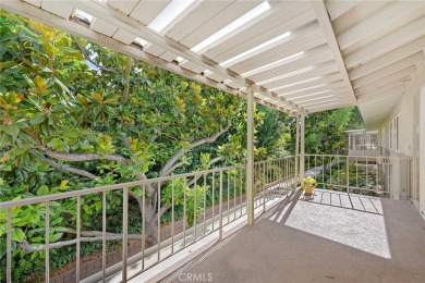 This is a light and bright upstairs coop in the heart of Laguna on Laguna Woods Village Golf Course in California - for sale on GolfHomes.com, golf home, golf lot