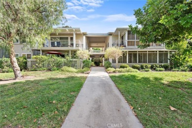 This is a light and bright upstairs coop in the heart of Laguna on Laguna Woods Village Golf Course in California - for sale on GolfHomes.com, golf home, golf lot