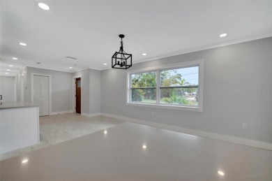 Welcome to this fully renovated 4-bedroom, 2-bathroom on Bradenton Country Club in Florida - for sale on GolfHomes.com, golf home, golf lot