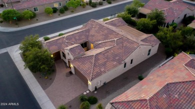 Step into style and comfort through a private courtyard w/a on Copper Canyon Golf Club in Arizona - for sale on GolfHomes.com, golf home, golf lot