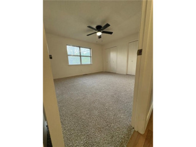 Nice two level brick home in a gorgeous area close to the lake on Prairie Creek Country Club in Arkansas - for sale on GolfHomes.com, golf home, golf lot