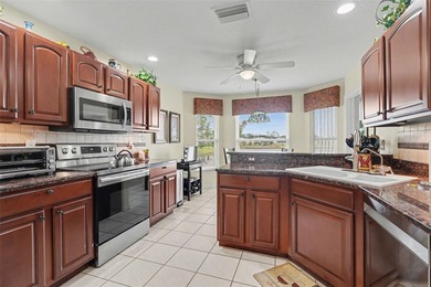 Welcome to 10926 Collar Drive, a beautifully maintained on Tampa Bay Golf and Country Club in Florida - for sale on GolfHomes.com, golf home, golf lot