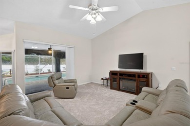 This beautifully maintained three-bedroom, two-bathroom POOL on Spring Hill Golf Course in Florida - for sale on GolfHomes.com, golf home, golf lot