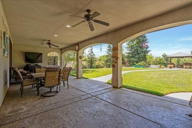 Welcome to your dream home on the 15th tee box at River Island on River Island Country Club in California - for sale on GolfHomes.com, golf home, golf lot