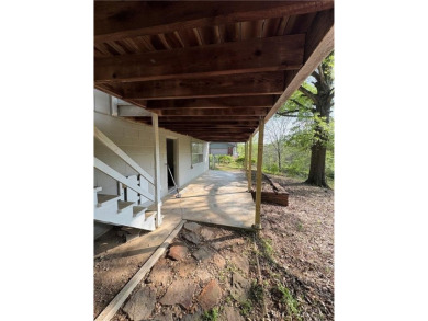 Nice two level brick home in a gorgeous area close to the lake on Prairie Creek Country Club in Arkansas - for sale on GolfHomes.com, golf home, golf lot