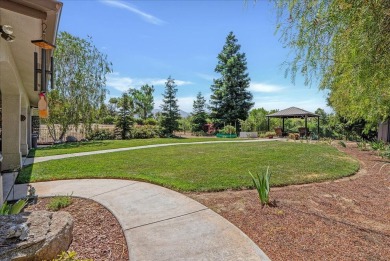 Welcome to your dream home on the 15th tee box at River Island on River Island Country Club in California - for sale on GolfHomes.com, golf home, golf lot