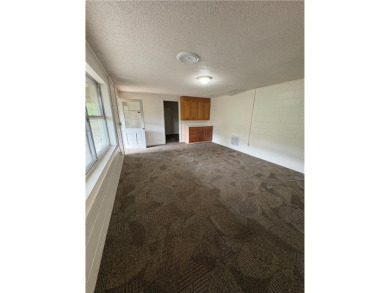 Nice two level brick home in a gorgeous area close to the lake on Prairie Creek Country Club in Arkansas - for sale on GolfHomes.com, golf home, golf lot