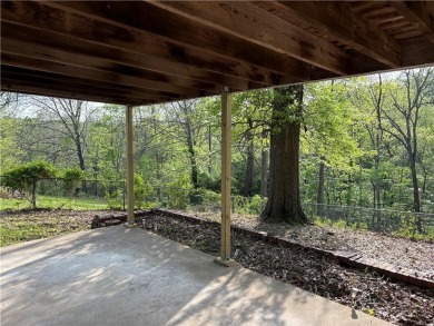 Nice two level brick home in a gorgeous area close to the lake on Prairie Creek Country Club in Arkansas - for sale on GolfHomes.com, golf home, golf lot