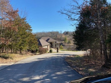 This lot is the perfect place to build your dream home!! Located on Ledgestone Country Club and Golf Course in Missouri - for sale on GolfHomes.com, golf home, golf lot